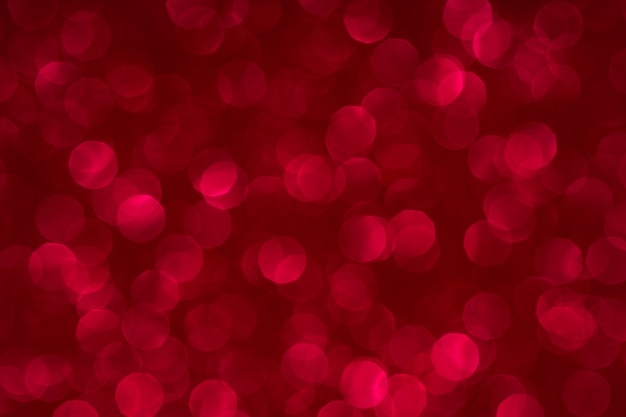 Defocused christmas glossy background textured red