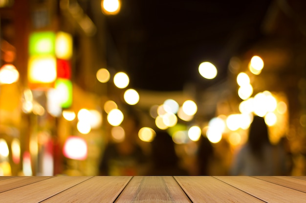 Defocused city night filtered bokeh abstract background.