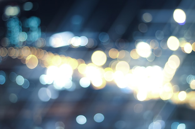 Defocused city night filtered bokeh abstract background.