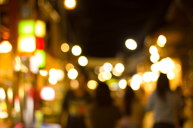 Defocused city night filtered bokeh abstract background.