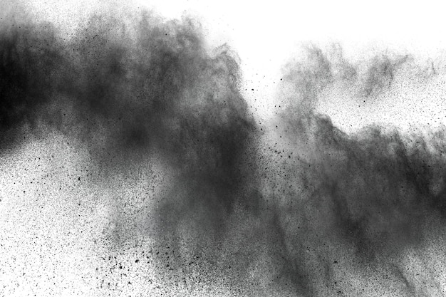 Photo defocused image of black powder paints against white background