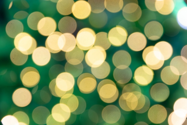 Defocused light bokeh of christmas light tree