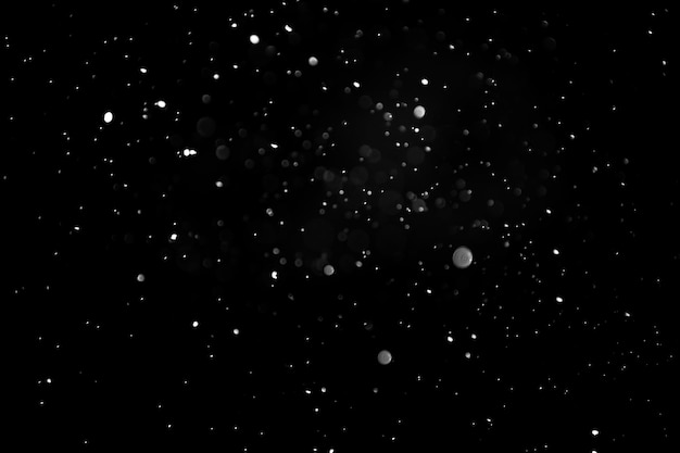 Defocused Snowing or raindrops on a dark background Overlay