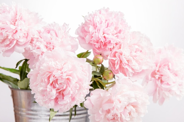 Delicate beautiful pink bouquet of peonies closeup wedding card invitation romantic image