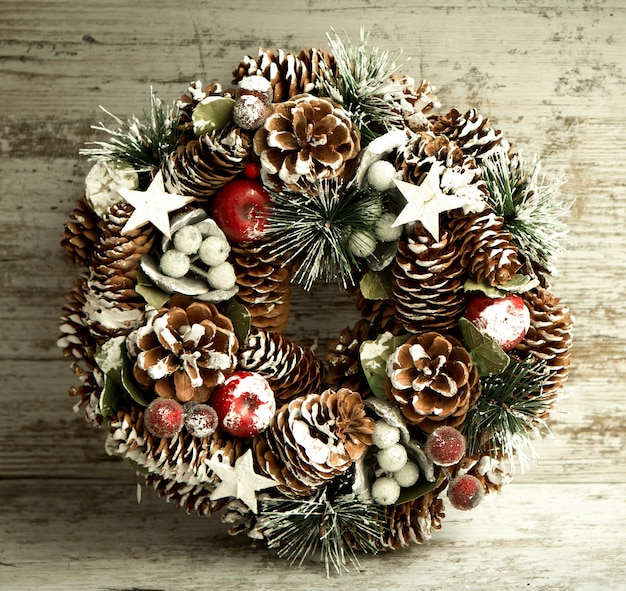 Delicate Christmas wreath of pine cones