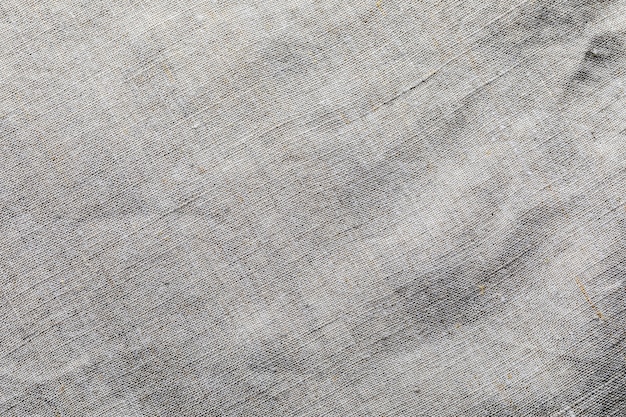 Delicate linen fabric texture. Macro close-up. With space for your texts.