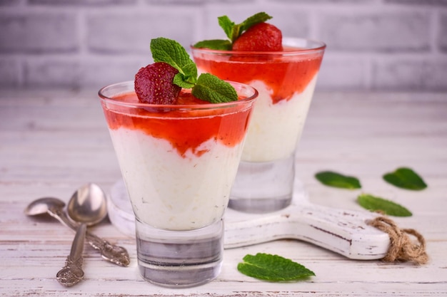 Delicate rice pudding with strawberry jam.