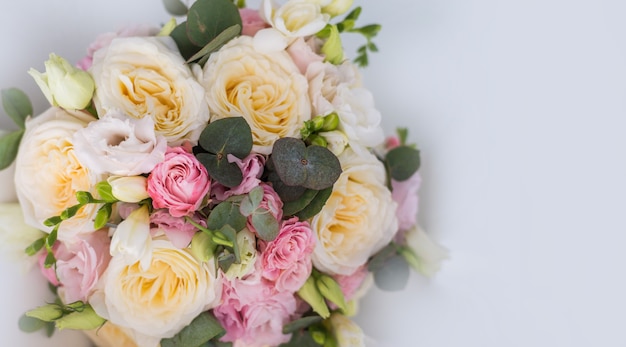 The delicate rustic floral bouquet on grey background