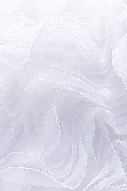 Delicate texture of silk fabric with flowing waves of white silk Vertical wedding background Background image for decor