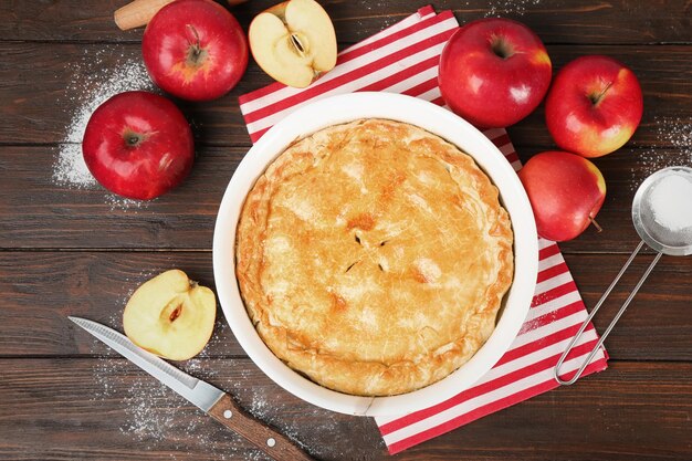 Delicious American apple pie on table