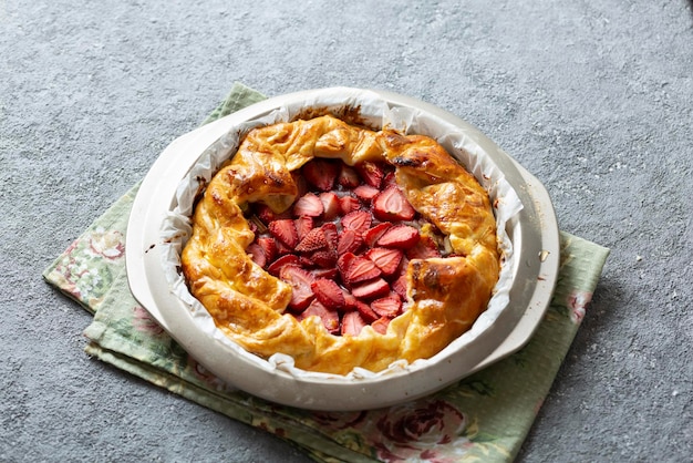 Delicious baked tart with strawberries Copy space top view