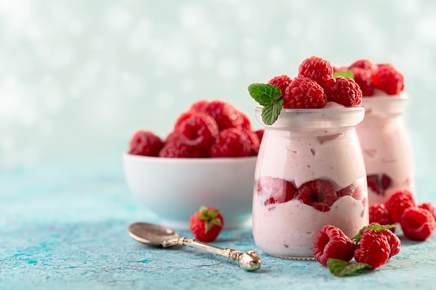 Delicious berry yogurt with fresh raspberries