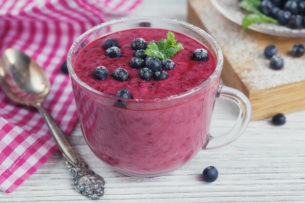 Delicious bilberry smoothie with fresh berries