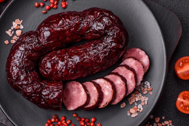 Delicious black blood sausage or black pudding with spices and herbs