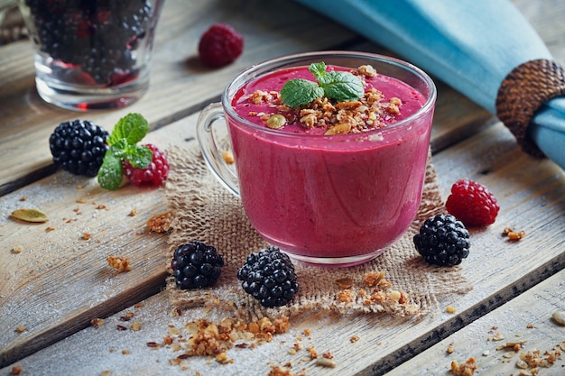 Delicious blackberry and raspberry smoothie, detox yogurt or milkshake with fresh berries