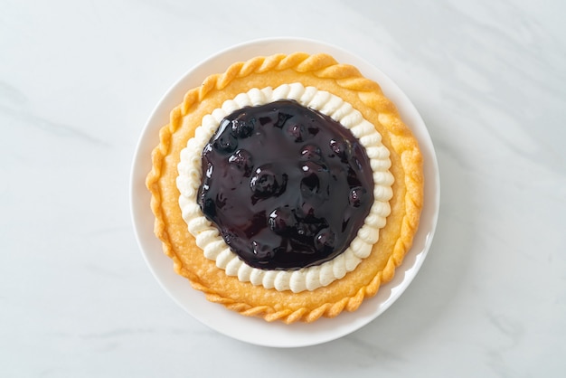 Delicious Blueberry Cheese Pie on white plate