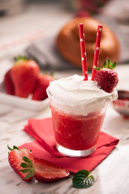 Delicious breakfast with strawberry granita and brioches