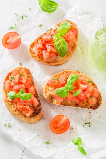 Delicious bruschetta with tomato and basil for a snack