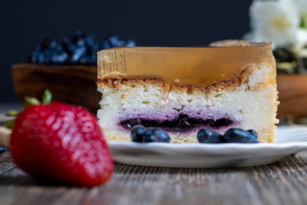 Delicious cake with blueberry filling and transparent jelly