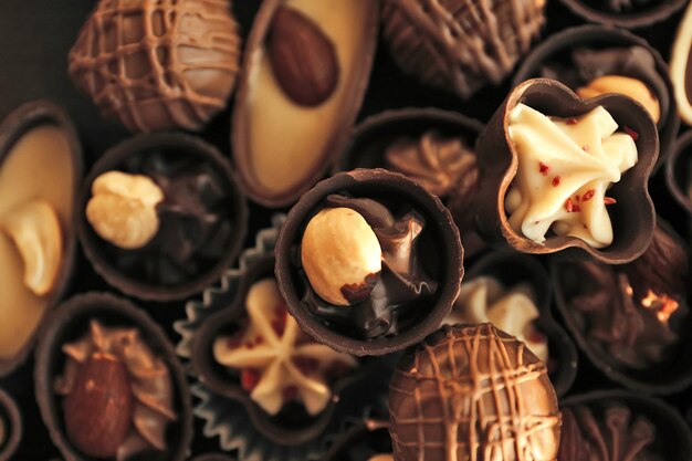 Delicious chocolate candies background, close up