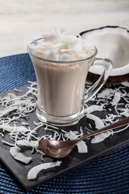 Delicious coconut mousse in glass cup