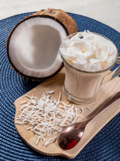 Delicious coconut mousse in glass cup