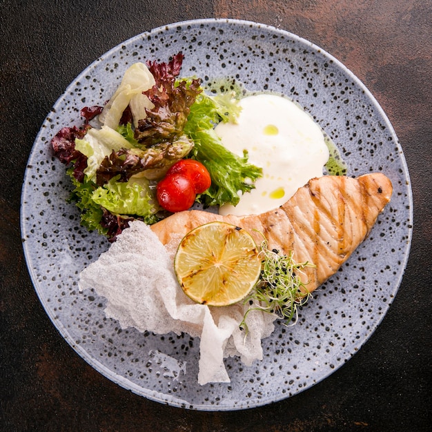 Delicious cooked fish meal on plate