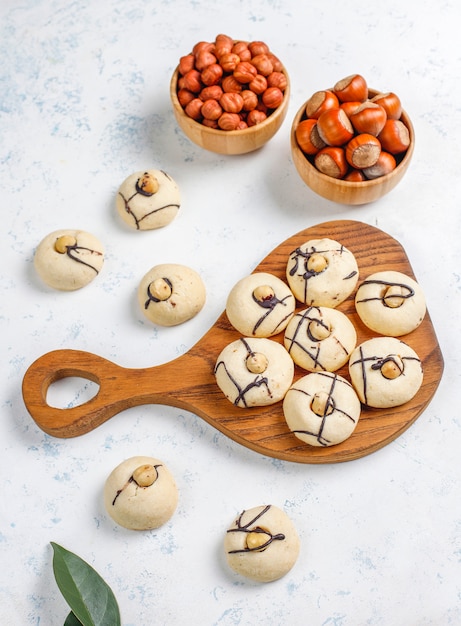 Delicious cookies with hazelnuts, top view