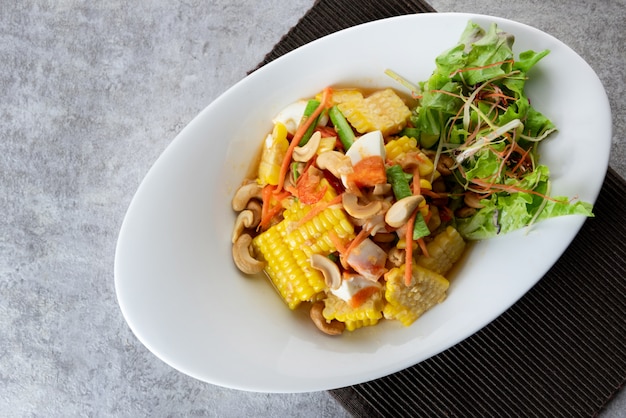 Delicious corn spicy salad, papaya salad, Thai Style food