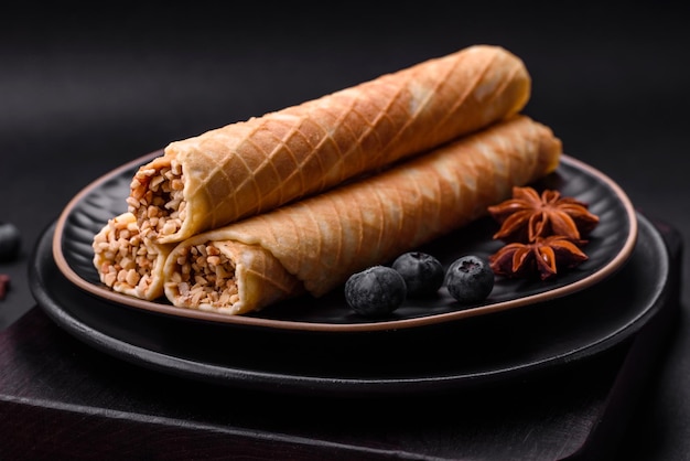 Delicious crispy wafer rolls with cream filling with nuts