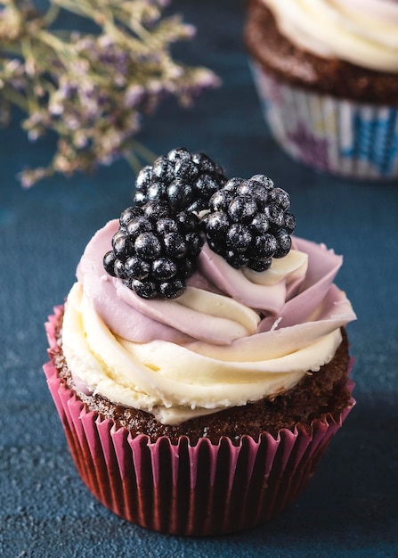 Delicious cupcake with blackberry Closeup