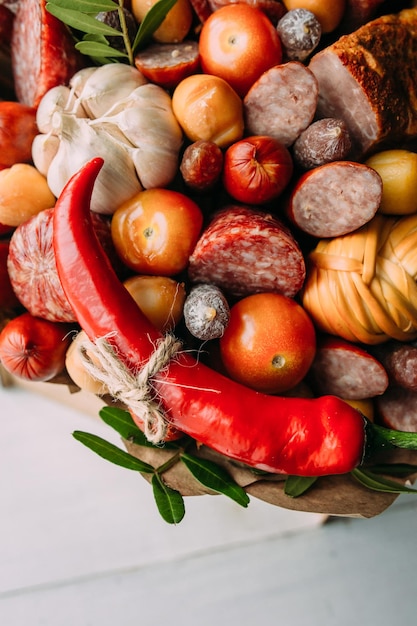 Delicious edible bouquet of sausage tomatoes cheese Gift for man