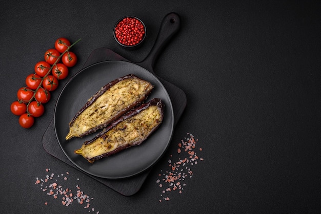 Delicious eggplant cut into two halves baked with salt spices and herbs