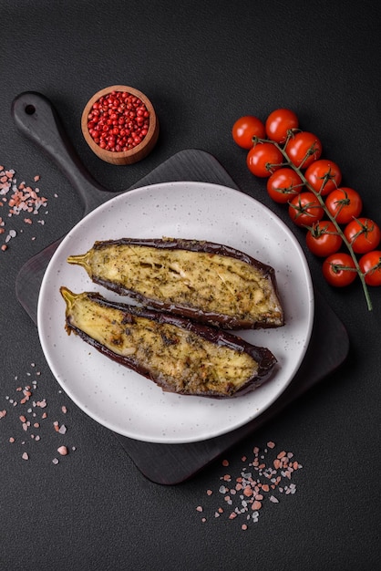 Delicious eggplant cut into two halves baked with salt spices and herbs