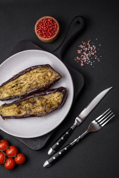 Delicious eggplant cut into two halves baked with salt spices and herbs