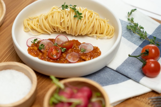 Delicious foods spaghetti minced meat top tomato decorative spices Postulate