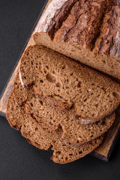 Delicious fresh brown sourdough bread with grains