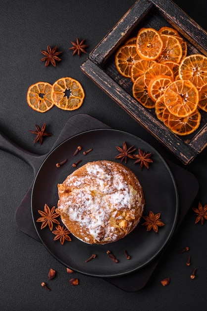 Delicious fresh christmas pie with fruit and raisin panettone