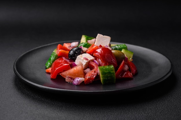 Delicious fresh Greek salad with feta cheese olives tomatoes and cucumbers