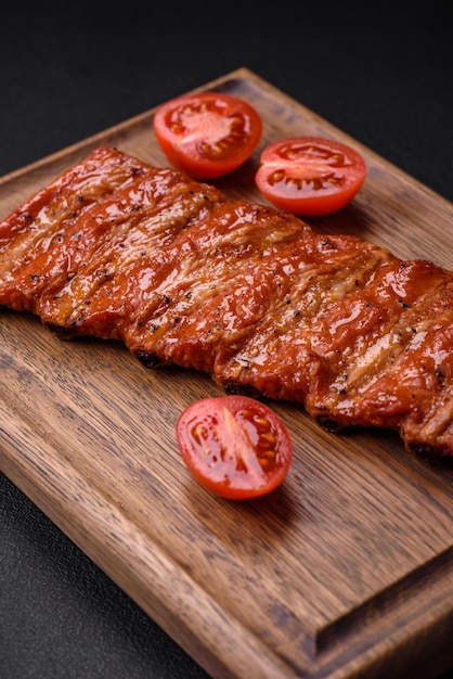 Delicious fresh grilled or smoked ribs with salt spices and herbs