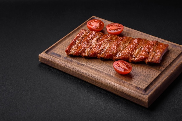 Delicious fresh grilled or smoked ribs with salt spices and herbs