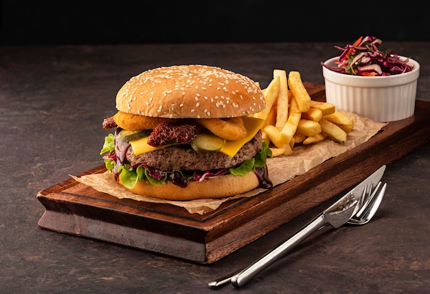 Delicious fresh homemade cheeseburger with french fries