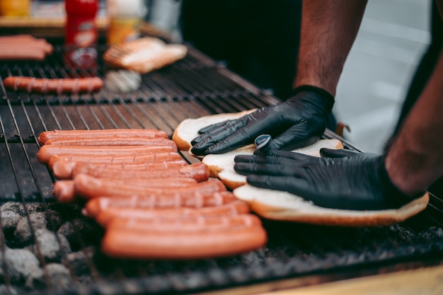 Delicious fresh hot dogs on the grill