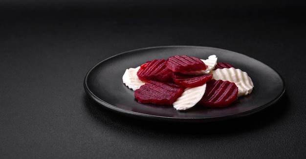 Delicious fresh mozzarella and boiled beets cut into slices