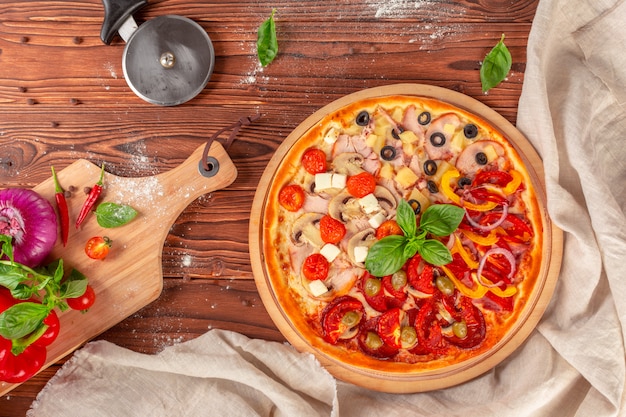 Delicious fresh pizza served on wooden table