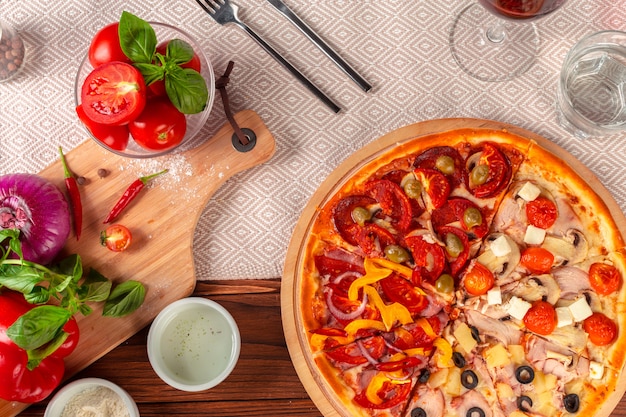 Delicious fresh pizza served on wooden table