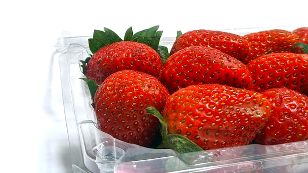 Delicious fresh red strawberries on white background top view