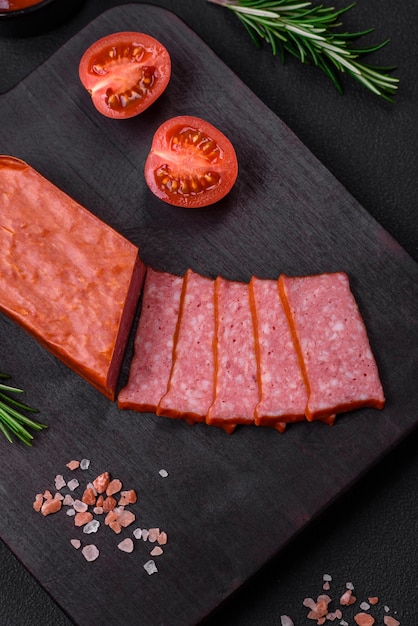 Delicious fresh sausage salami with salt tomatoes and spices