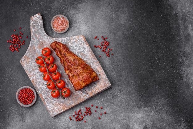 Delicious grilled or smoked pork ribs with salt spices and herbs