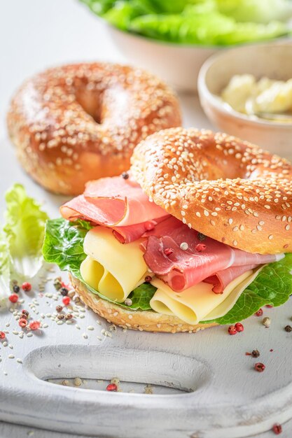 Delicious and healthy bagel with ham and cheese